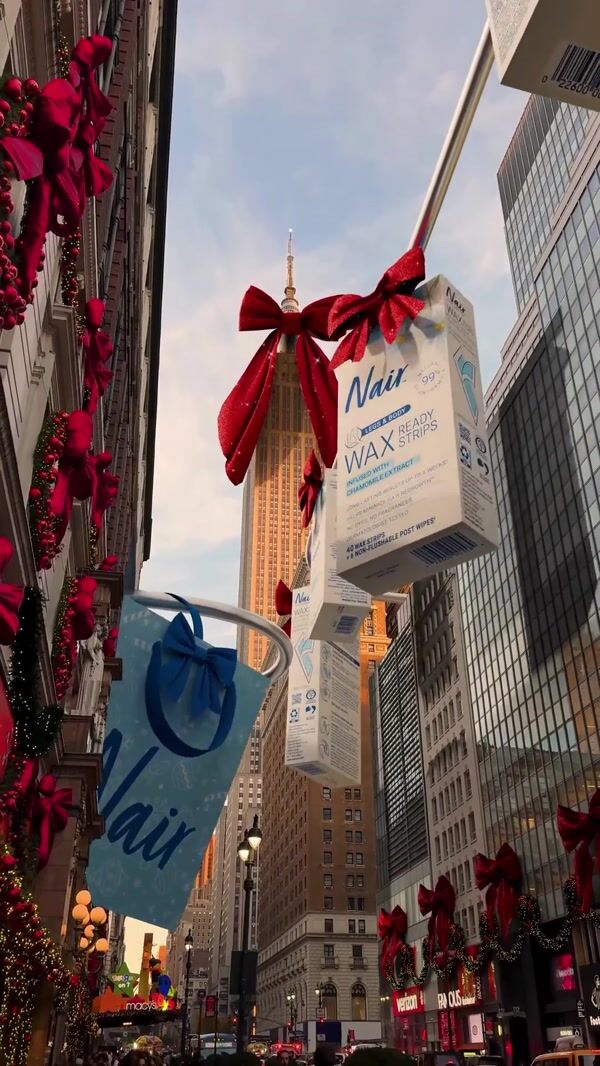 Nair Giant Products and Shopping Bags Hang in Times Square