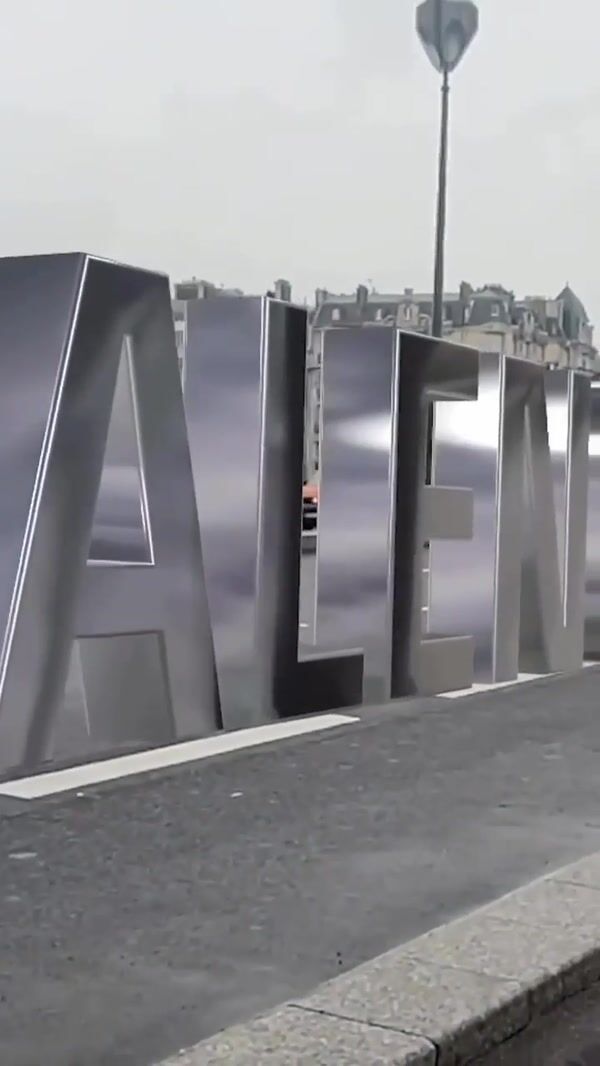 Balenciaga Metallic Letter Standees on Street