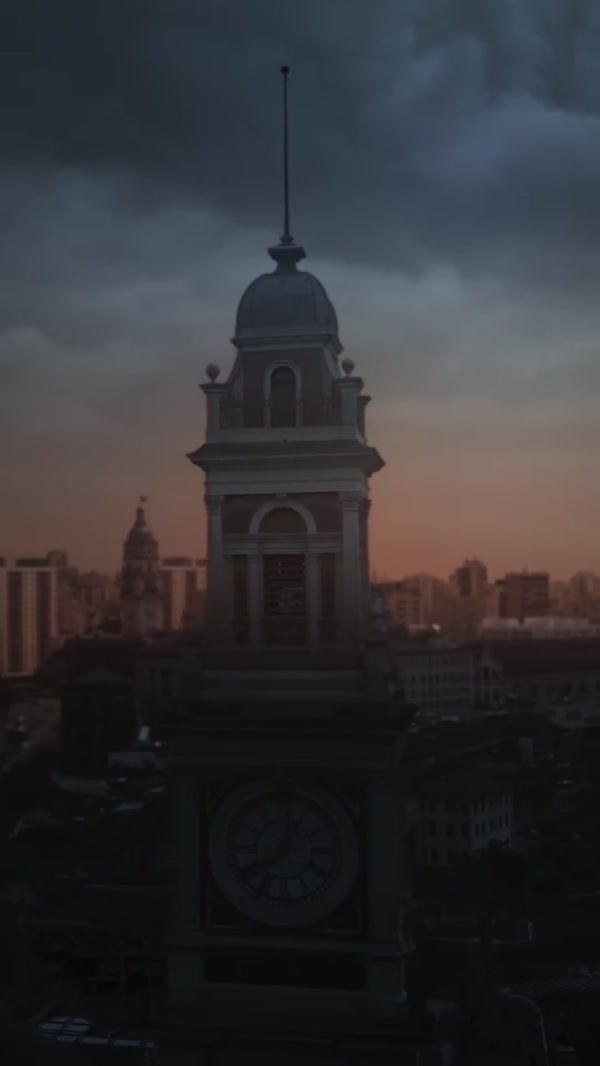 Claro Red Umbrella Hovers Above the City