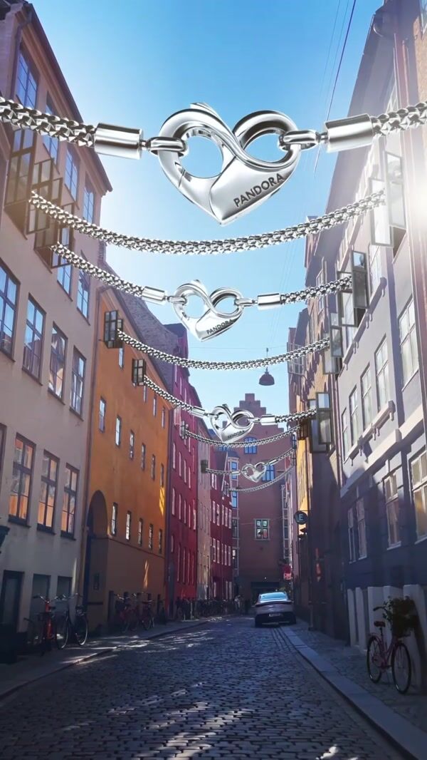 Pandora Bracelets Hanging From Colorful Buildings