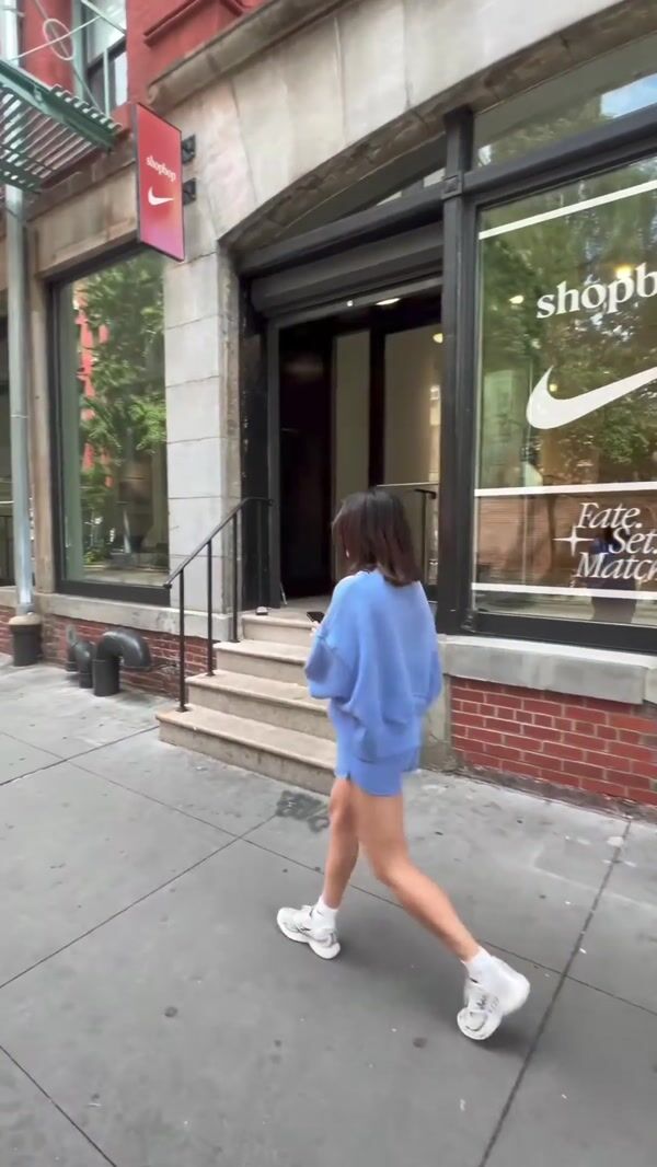 ShopBop Tennis Ball Stuck Between Buildings