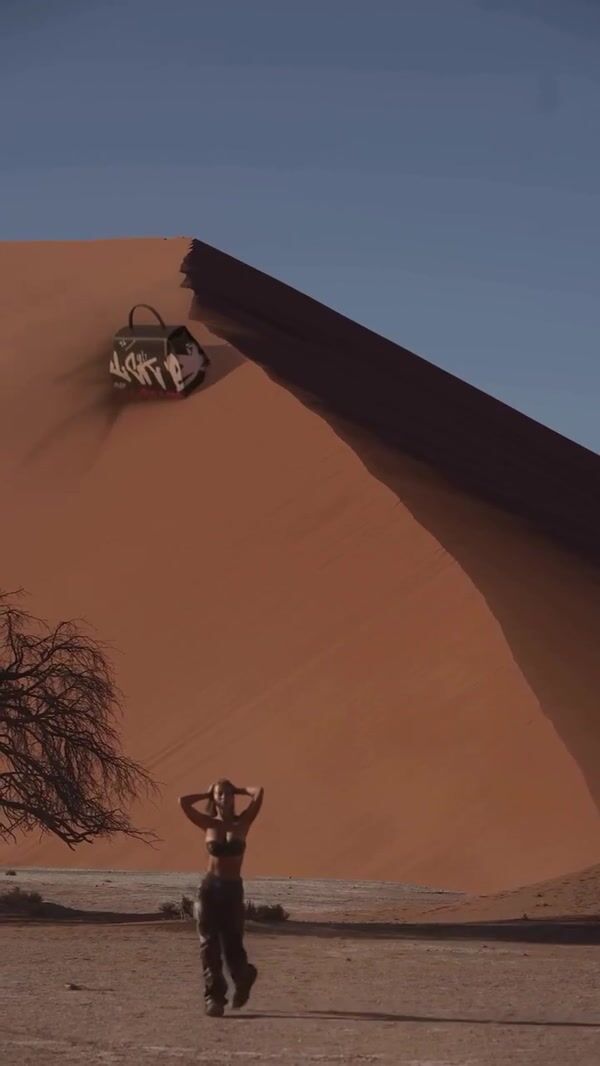 A Quick Buck Graffiti Bag Slides on Sand Dune