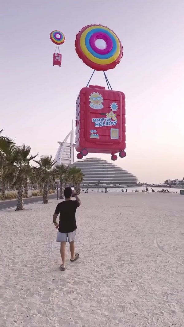 Centrepoint Suitcase on Inflatable Lands on Beach