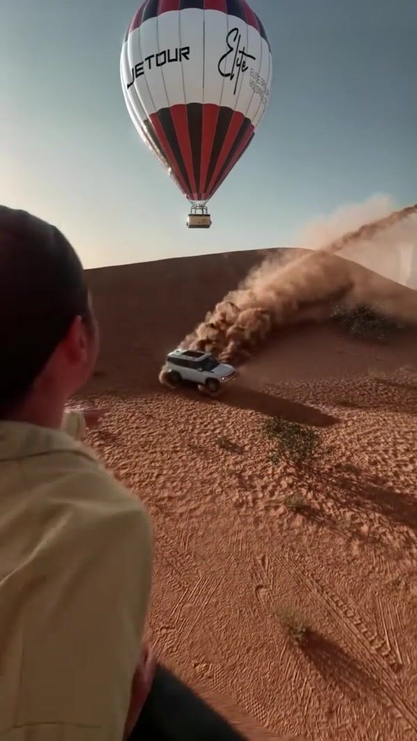 Jetour SUV Slides Over Sand Dunes