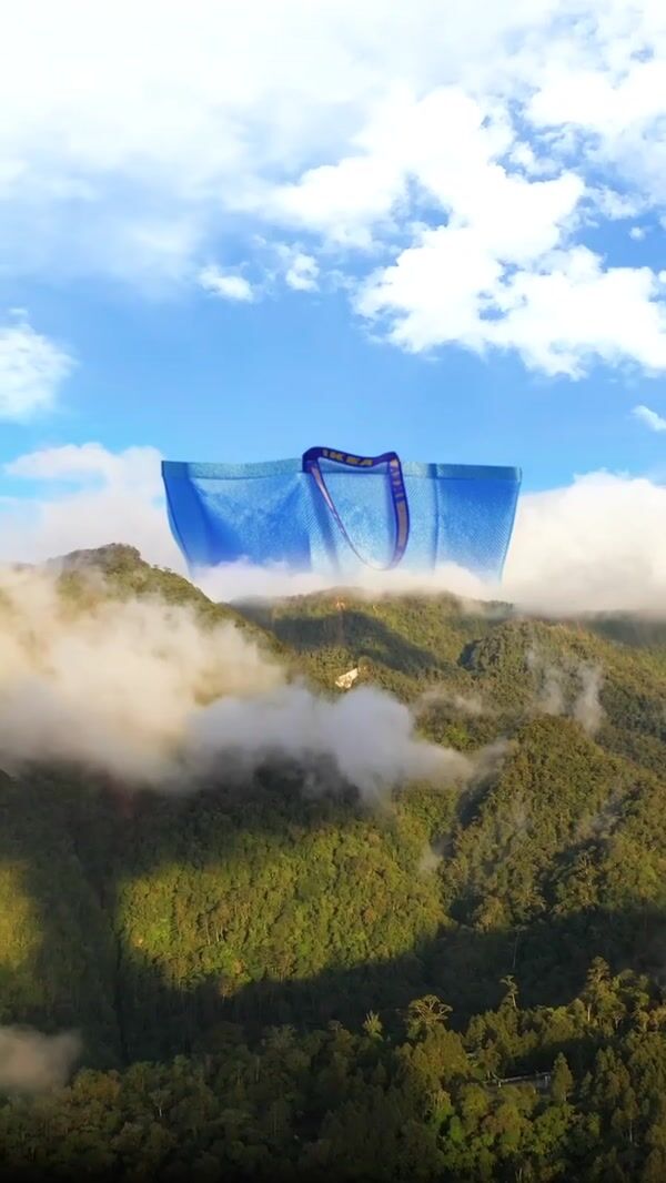 IKEA Blue Shopping Bag on Mountain Top