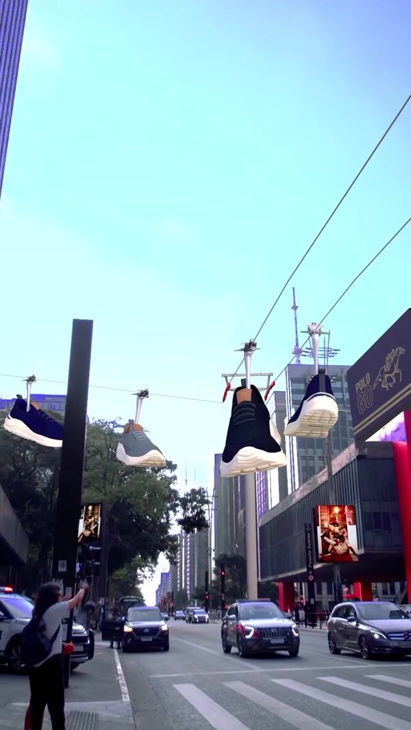 Polo Go Giant Sneakers Glide Through São Paulo Streets