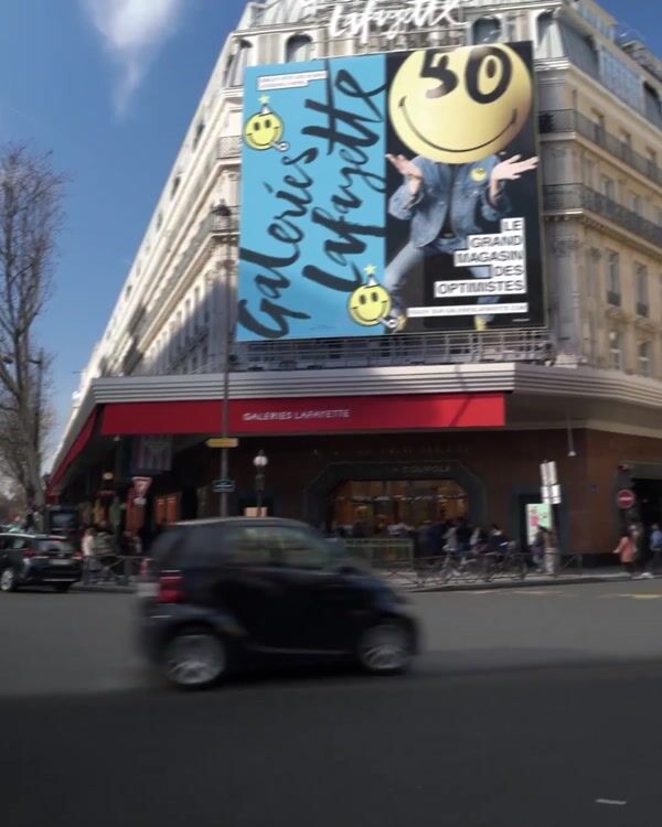 Galeries Lafayette Billboard Releases Smiley Faces