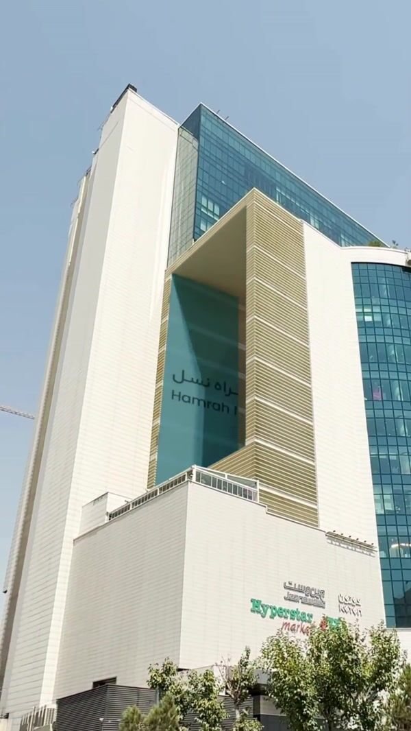 Hamrahnasl Massive Watch Emerges from Facade