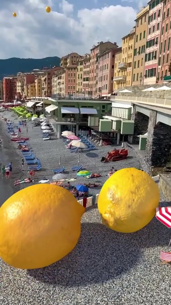 Jacquemus Lemons Falling From Sky at the Beach