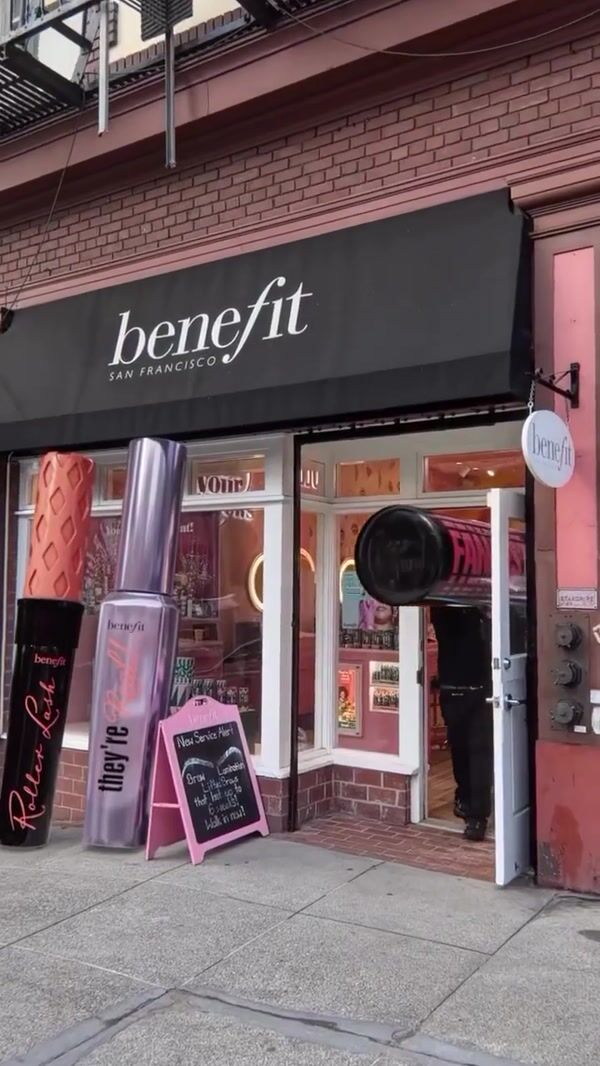 Benefit Cosmetics Men Carrying Giant Mascara