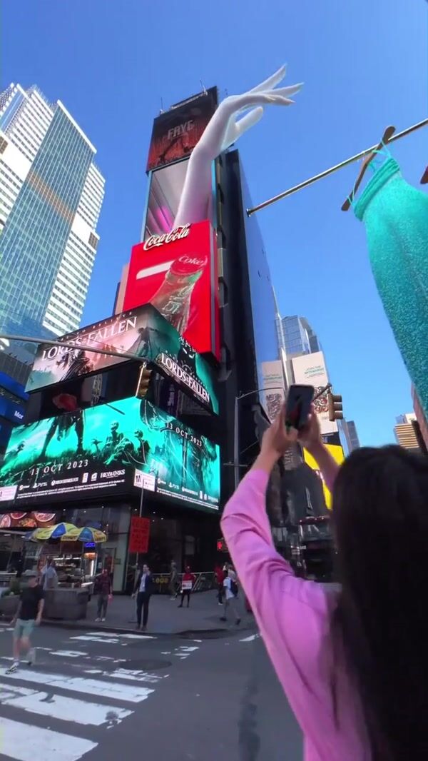 Oh Polly Giant Hand Pops Out of Billboard