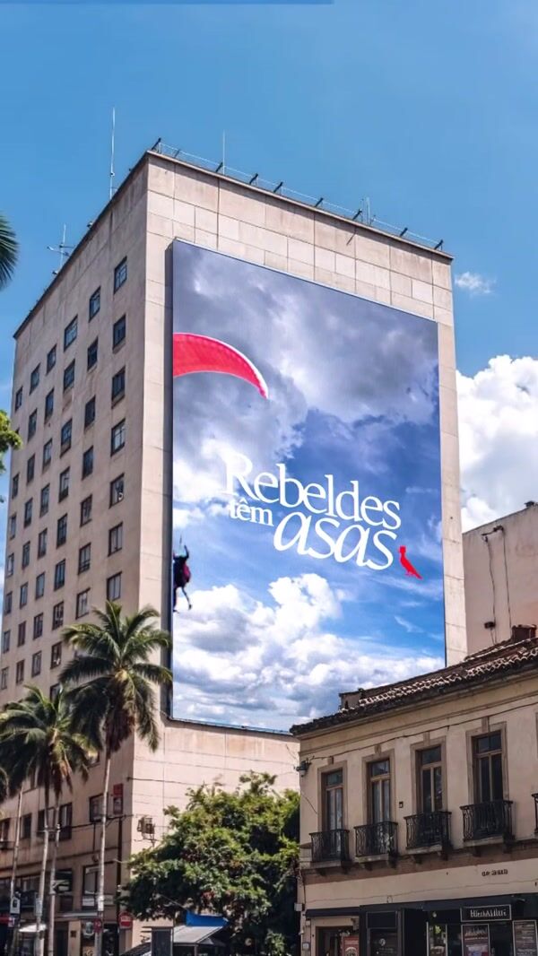 Reserva Paragliders Emerge from Billboard