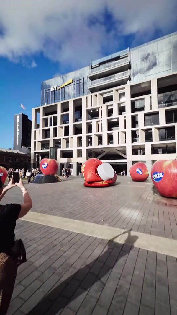 Picky Giant Apple Inflated into Giant Bottle