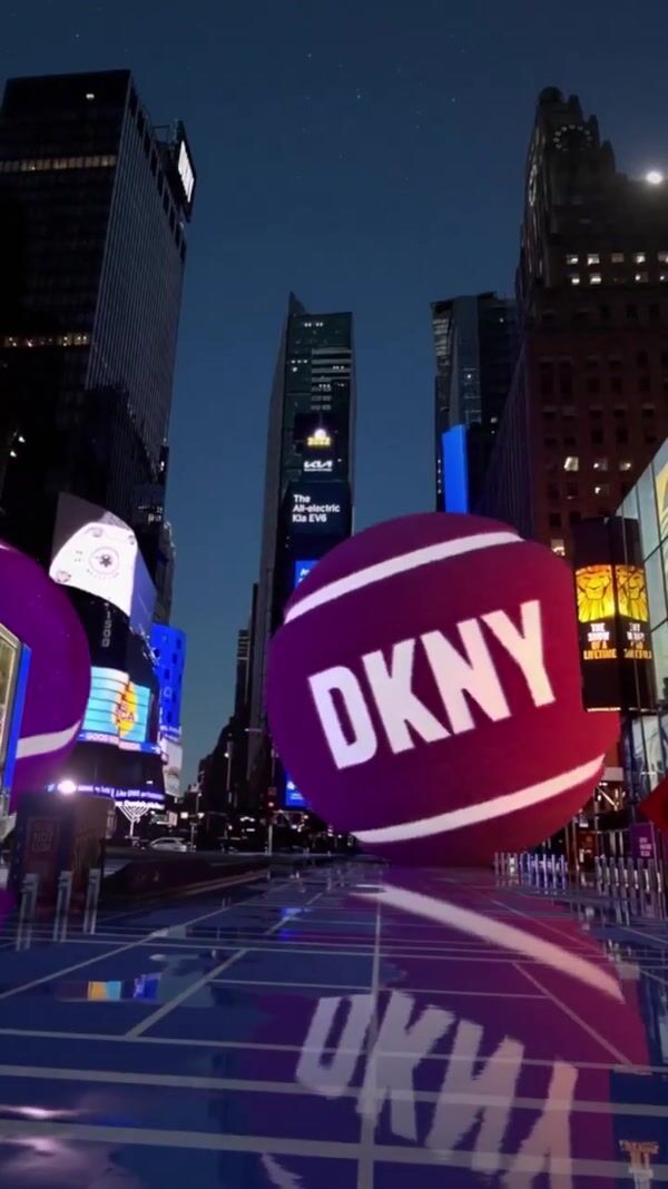 DKNY Tennis Balls Rolling at Times Square