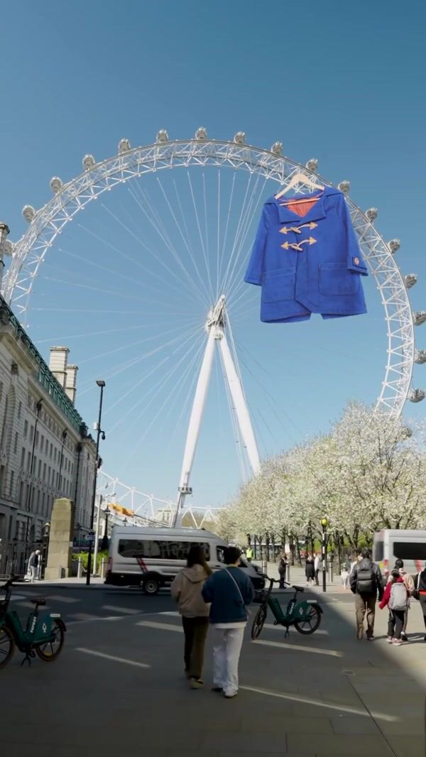 Paddington Giant Blue Duffle Coat Hangs from London Eye