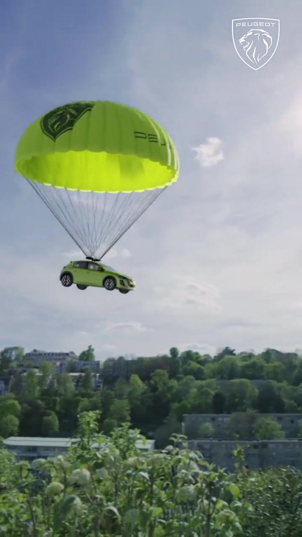Peugeot Green Car Descends by Parachute at Seine Musicale