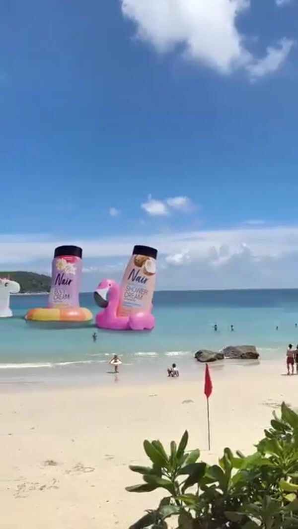 Nair Giant Products Relax on Beach Floaties