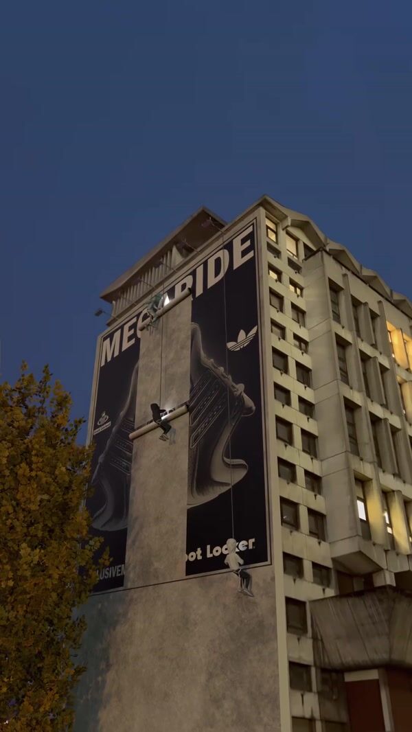 Foot Locker Aliens Installing Billboard on Building