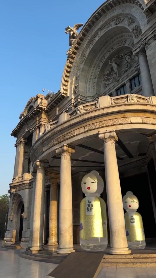 Benetton Perfume Bottle Exits from Building