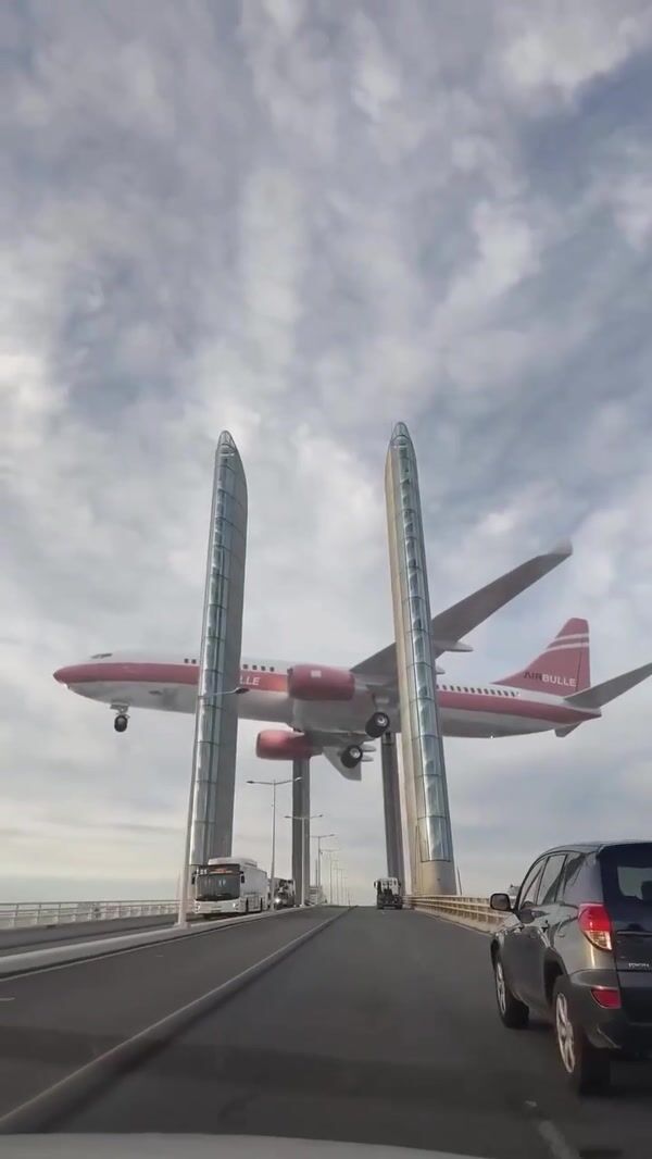 Quoifaireabordeaux Suspended Plane Above the Bridge