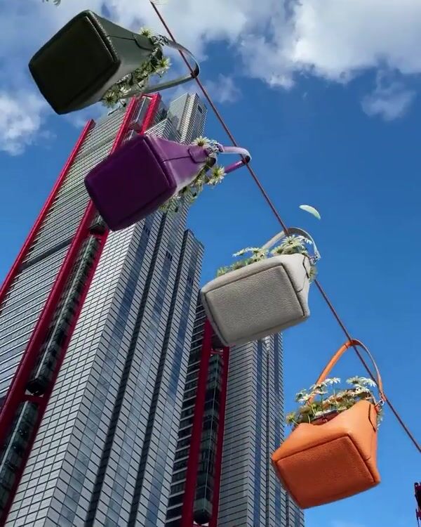 Vogue Giant Longchamp Bags Enter Billboard