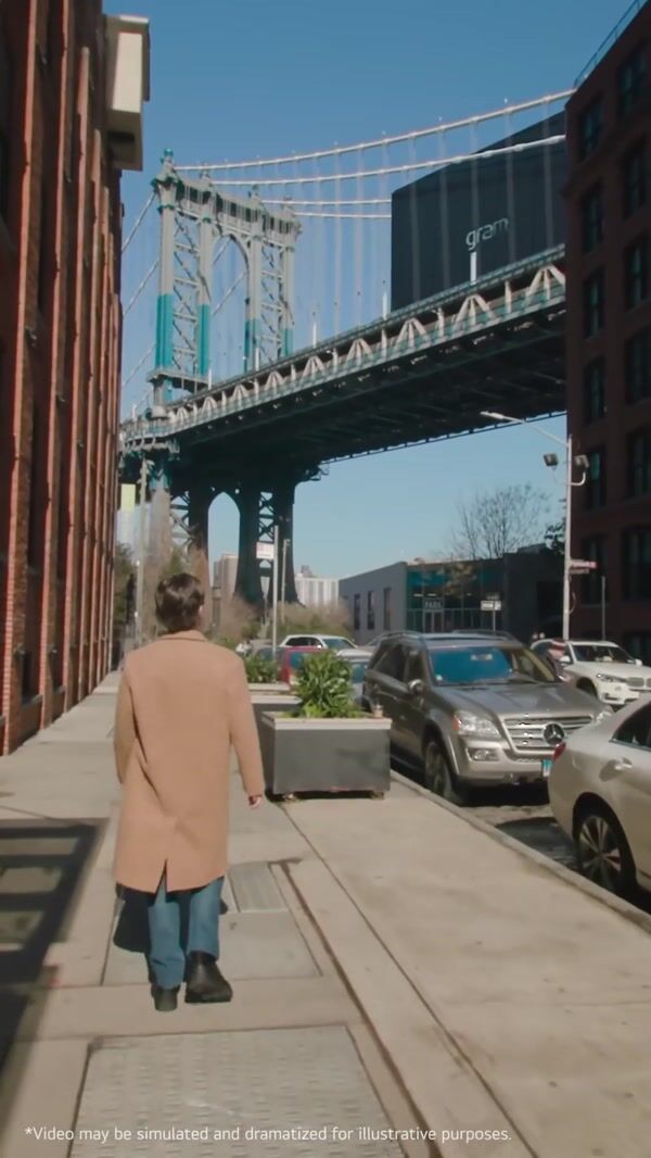 LG Laptop Driving on Manhattan Bridge