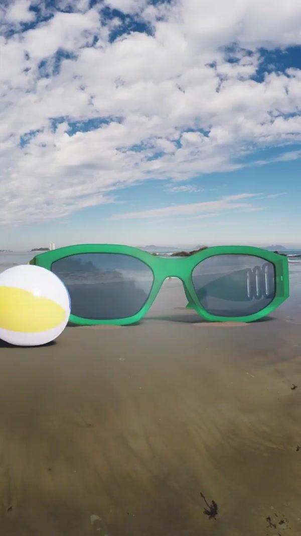 Pull&Bear Sunglass and Beach Ball on the Shore