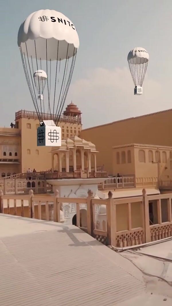 Snitch Parachutes Pull Red Cloth Off Store