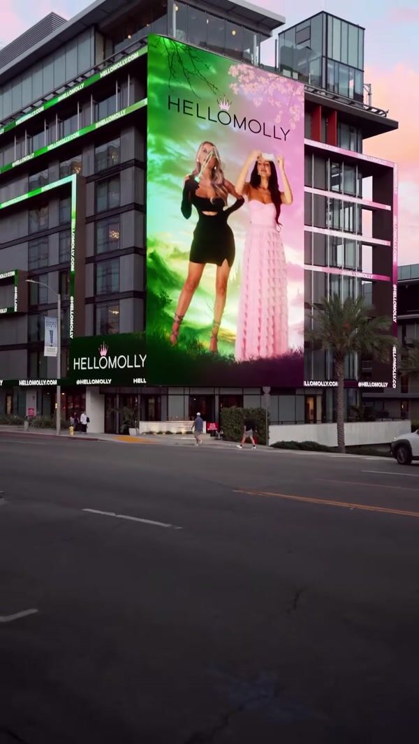 Hello Molly Model Throws Crown from Billboard