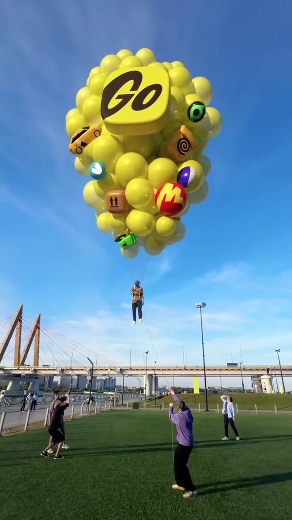 Yandex Go Balloon Stunt Lifts Man in Kazan