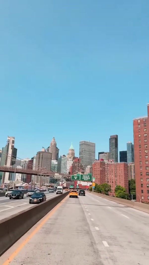 Prada Brand Signage Hangs Above Highway