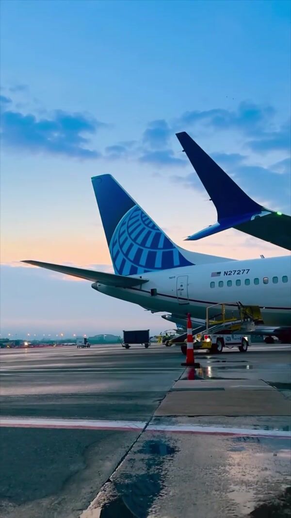 United Airlines Tail Reflected Upside Down in Snow