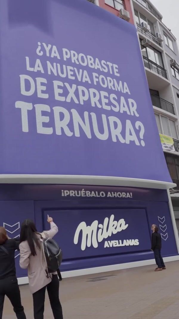 Milka Chocolate Bars Flow from Building