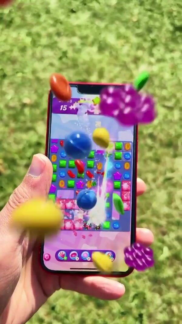 Candy Crush Candies Jump Out of Phone Screen