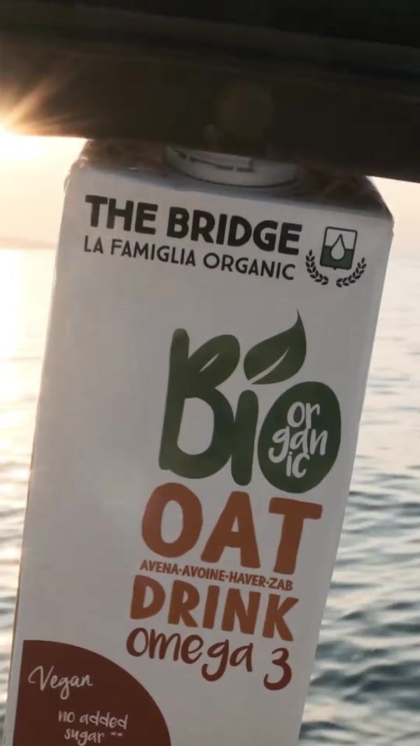 Bridge Bio Man Balancing on Piled Oat Drinks