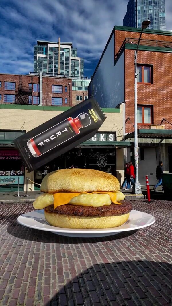 TRUFF Sachet Pours Hot Sauce on Sandwich