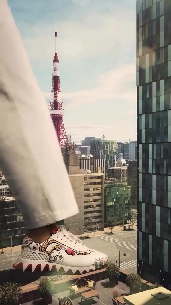 Christian Louboutin Giant in Sneakers on the Street