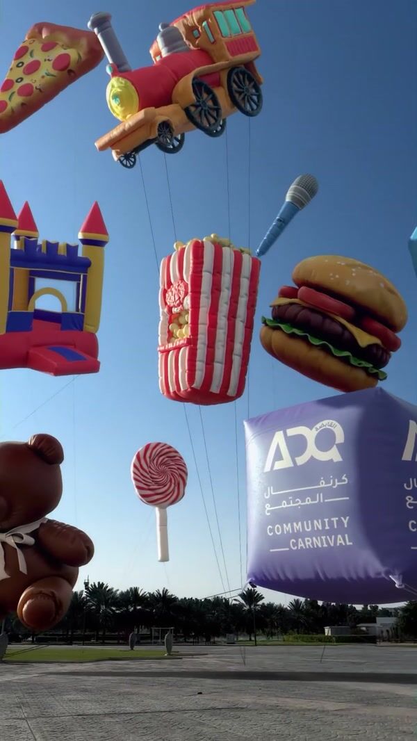 ADQ Community Giant Inflatables Floating at Park