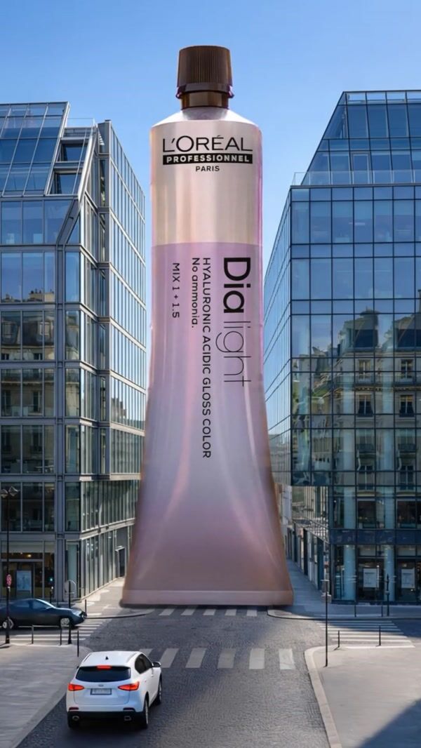 L’Oréal Giant Tube Towers Over City