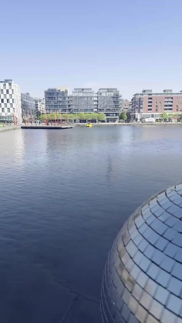 Aperol Spritz Giant Disco Ball Floats in River