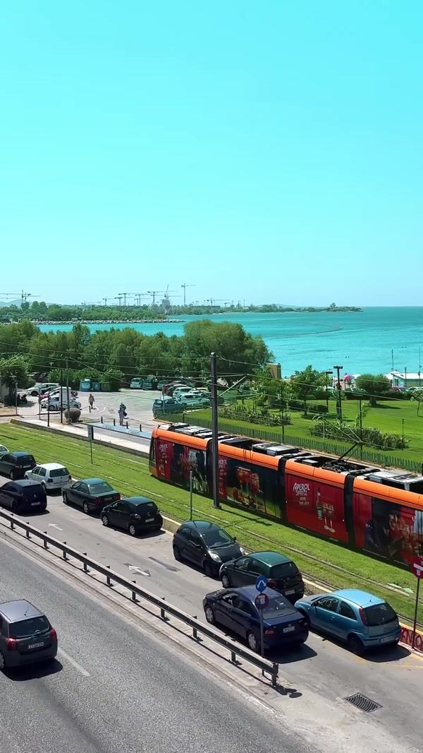 Aperol Spritz Glasses Riding on Tram