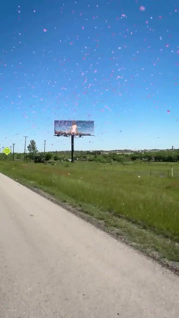Tory Burch Post Billboard with Confetti on Street