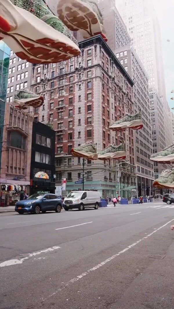 Tory Burch Sneakers Flying Like Cars Above Street