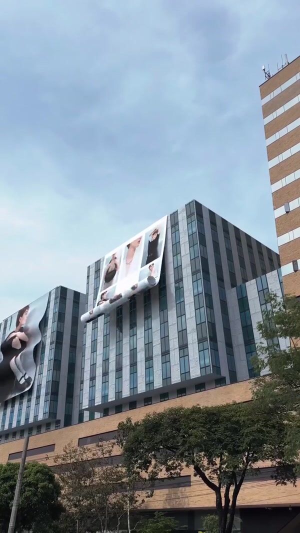 Punto Blanco Massive Banner Unveiled at Facade