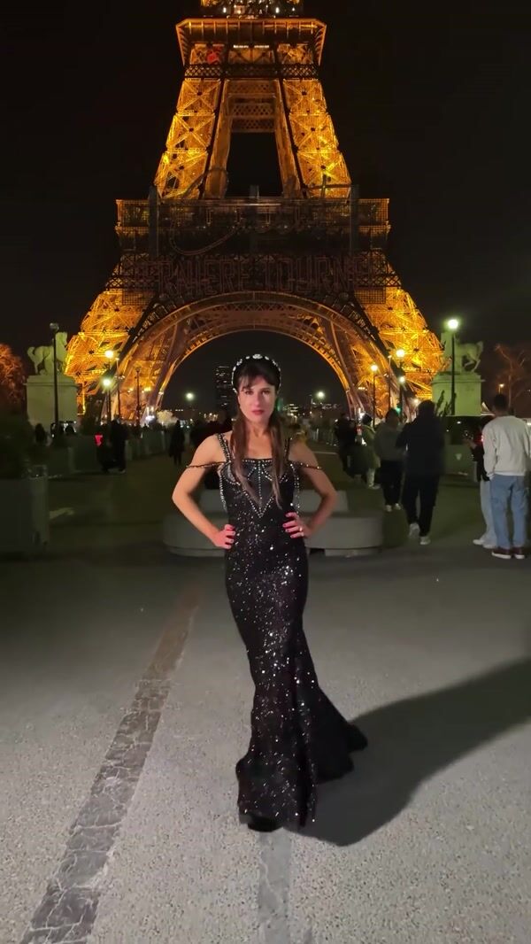 Marie Neon Signage Glows at Eiffel Tower