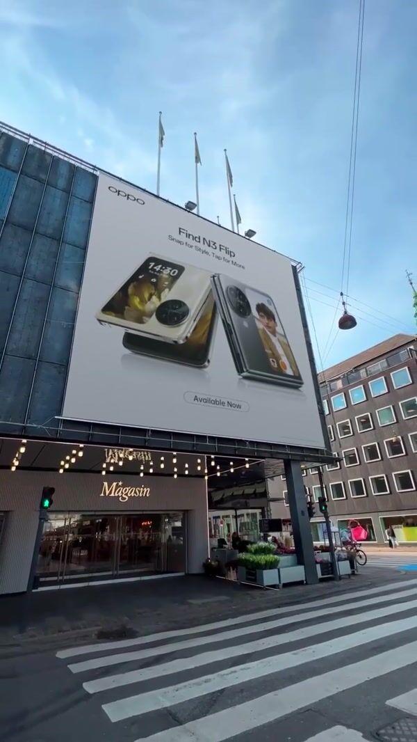 Oppo Flip Phone Bursts Out From Billboard