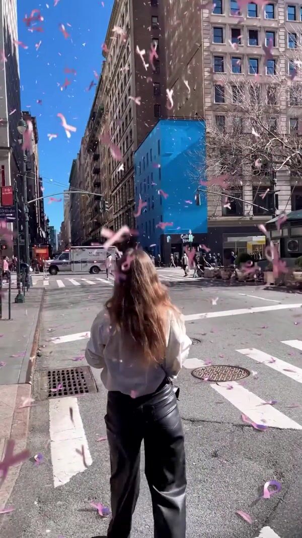 Flo Pink Ribbons Falling Over NYC