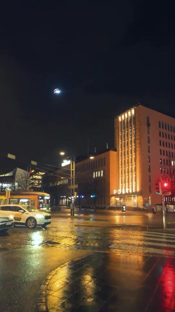 Posti Floating Truck Drops Ornaments on Building