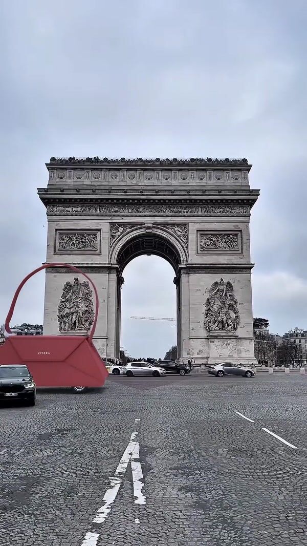 Zivera Giant Handbags Roll Past Arc de Triomphe