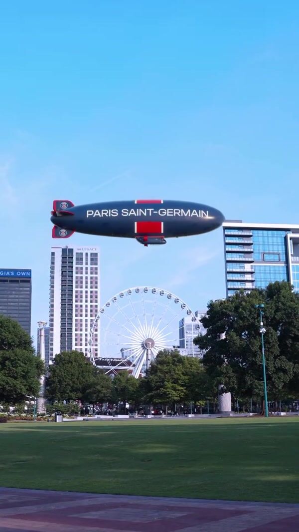 PSG Team Airships Hover Above Stadium